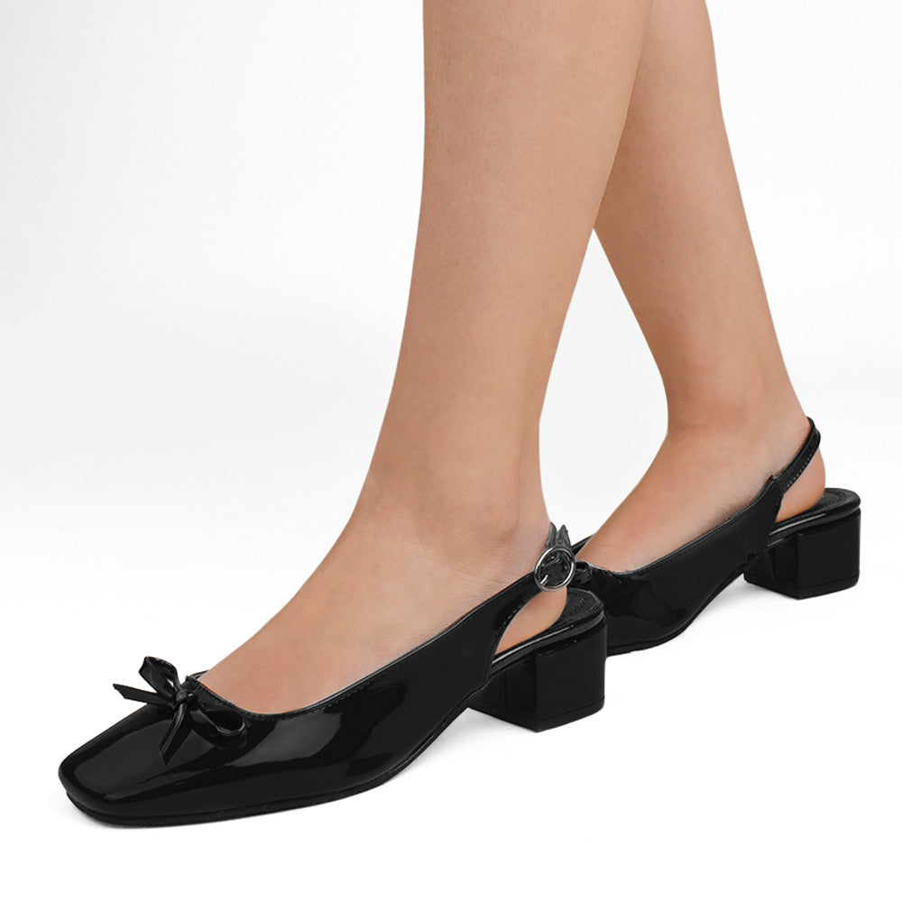 Zapatillas negras destalonadas para mujer con moño en punta cuadrada y tacón bajo de 5cm