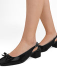 Zapatillas negras destalonadas para mujer con moño en punta cuadrada y tacón bajo de 5cm