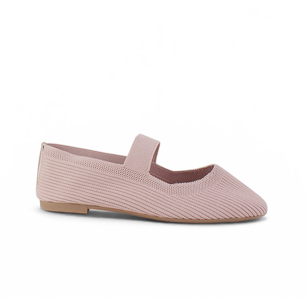 Vista lateral de flats tipo balerinas nude para mujer con pulsera de piso
