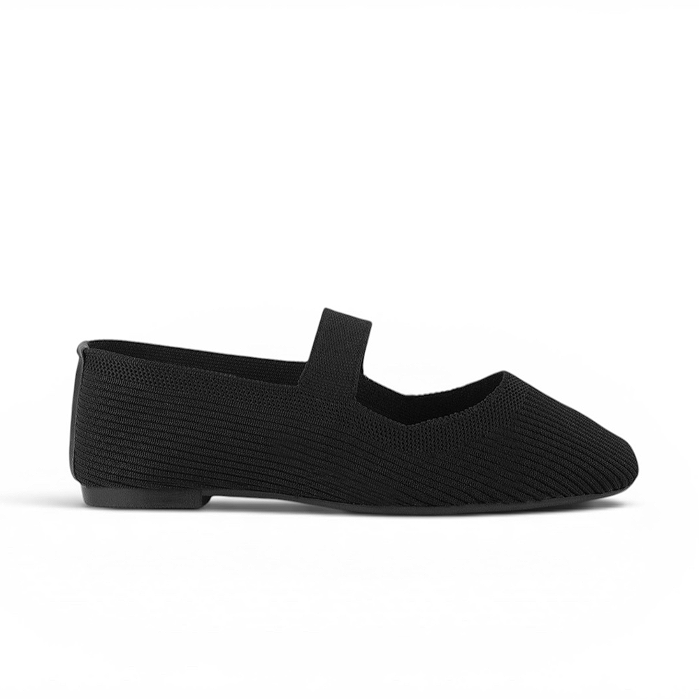 Vista lateral de flats tipo balerinas negras para mujer con pulsera de piso