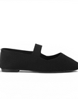 Vista lateral de flats tipo balerinas negras para mujer con pulsera de piso