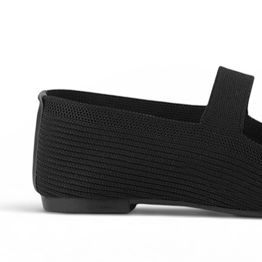 Vista trasera de flats tipo balerinas negras para mujer con pulsera de piso