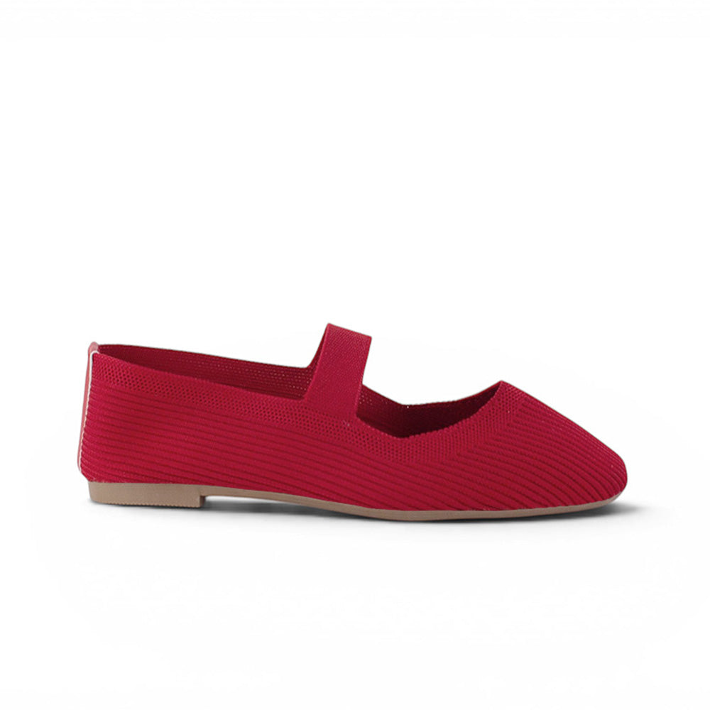 Vista lateral de flats tipo balerinas rojas para mujer con pulsera de piso