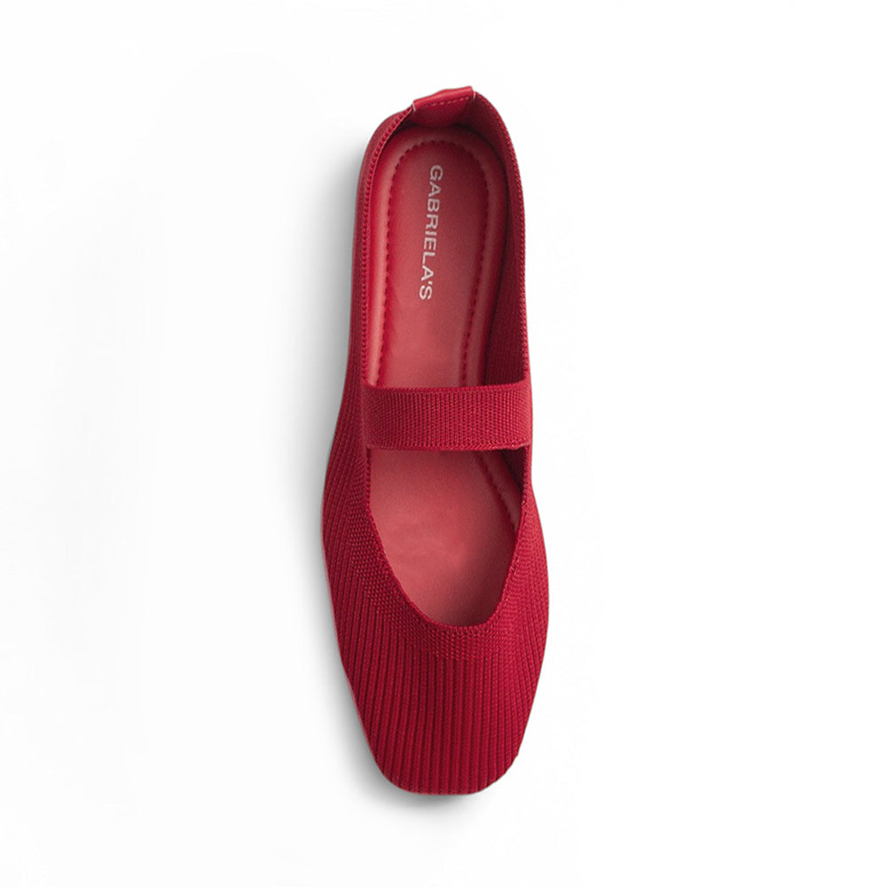Vista superior de flats tipo balerinas rojas con pulsera de piso para mujer