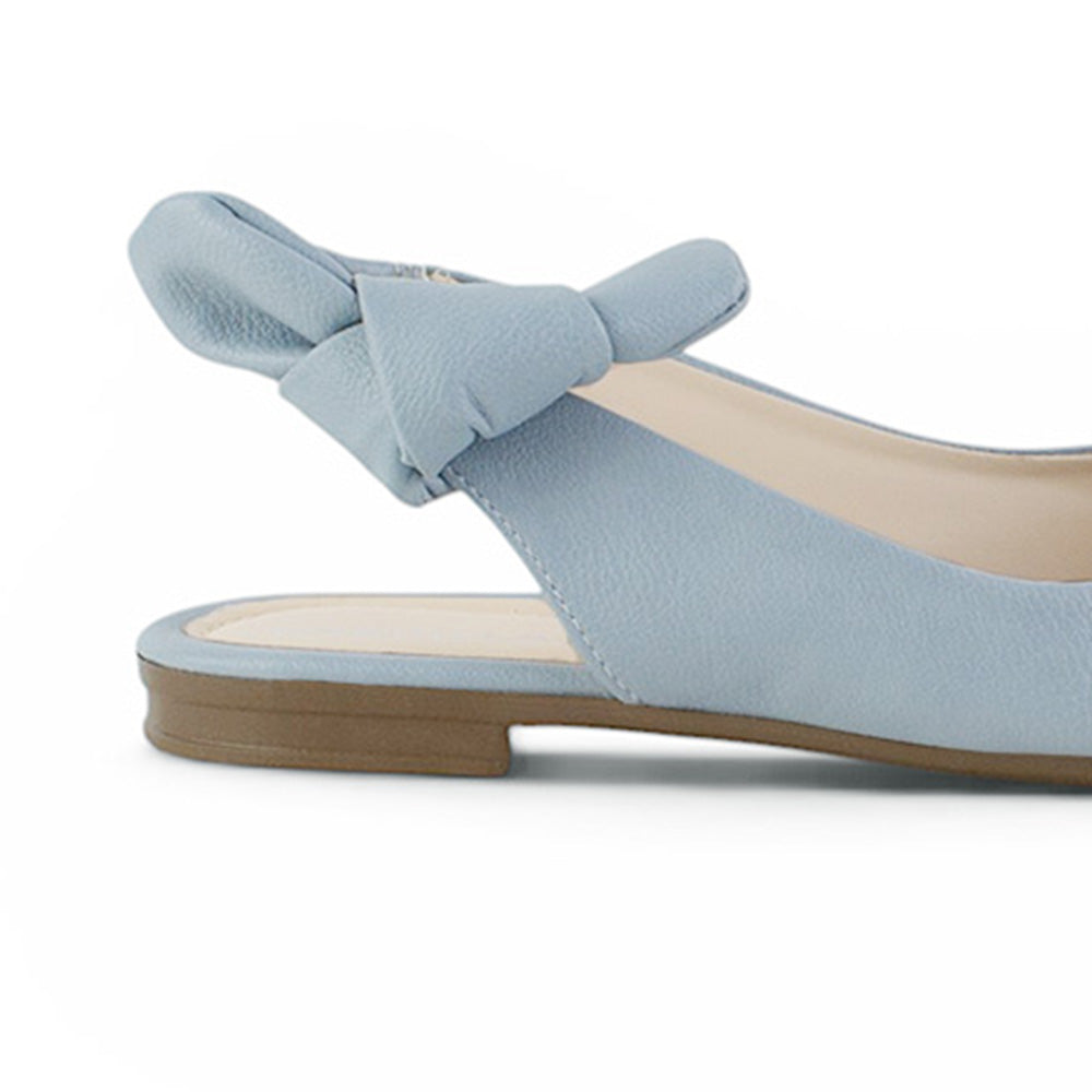 vista trasera de flats para dama azules de piso con nudo lateral 