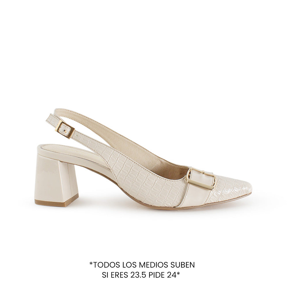 Vista lateral de zapatilla beige para dama de punta fina con pulsera ajustable y tacón medio 7cm
