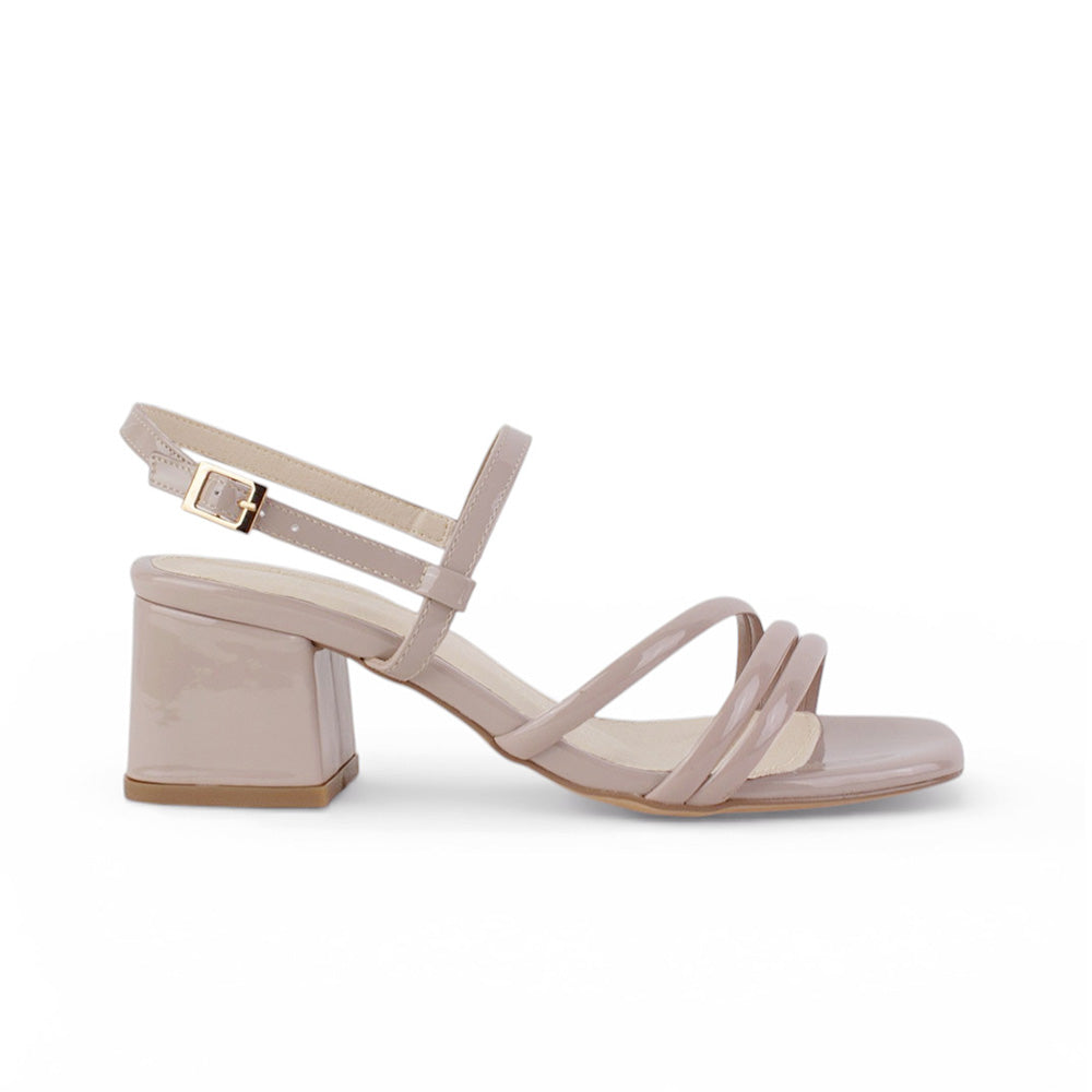 Vista lateral de zapatilla nude para mujer de diseño descubierto con tacón bajo de 6cm y tiras delgadas cruzadas