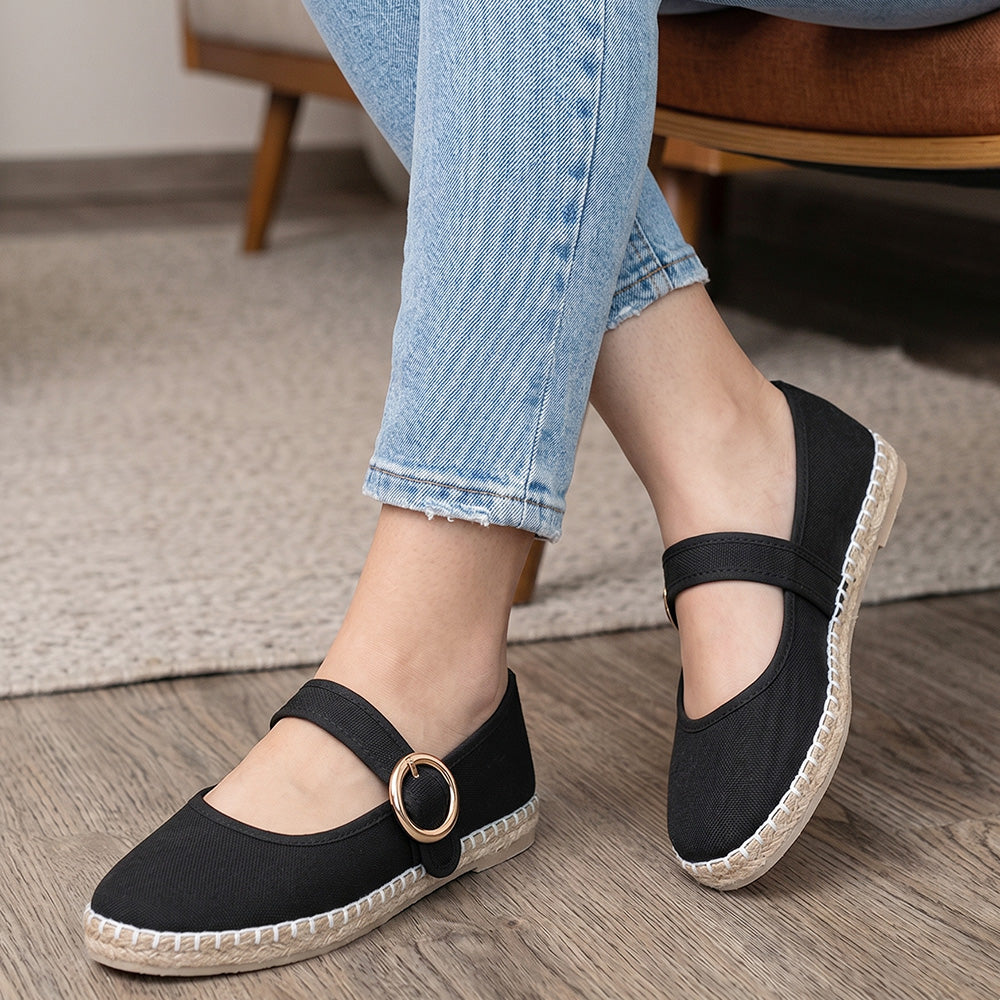 Alpargatas para mujer color negro con pulsera de piso.