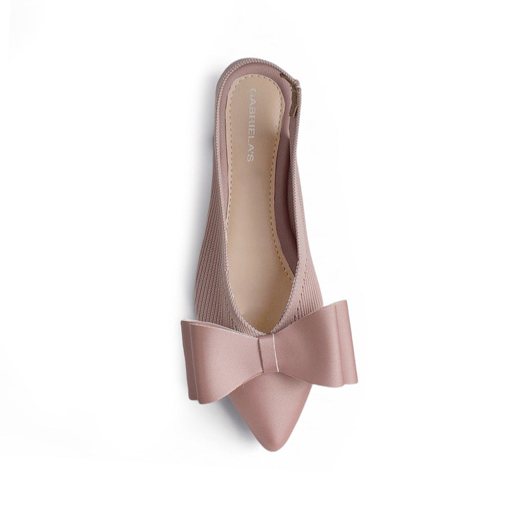 vista superior de flats maquillaje de mujer con moño
