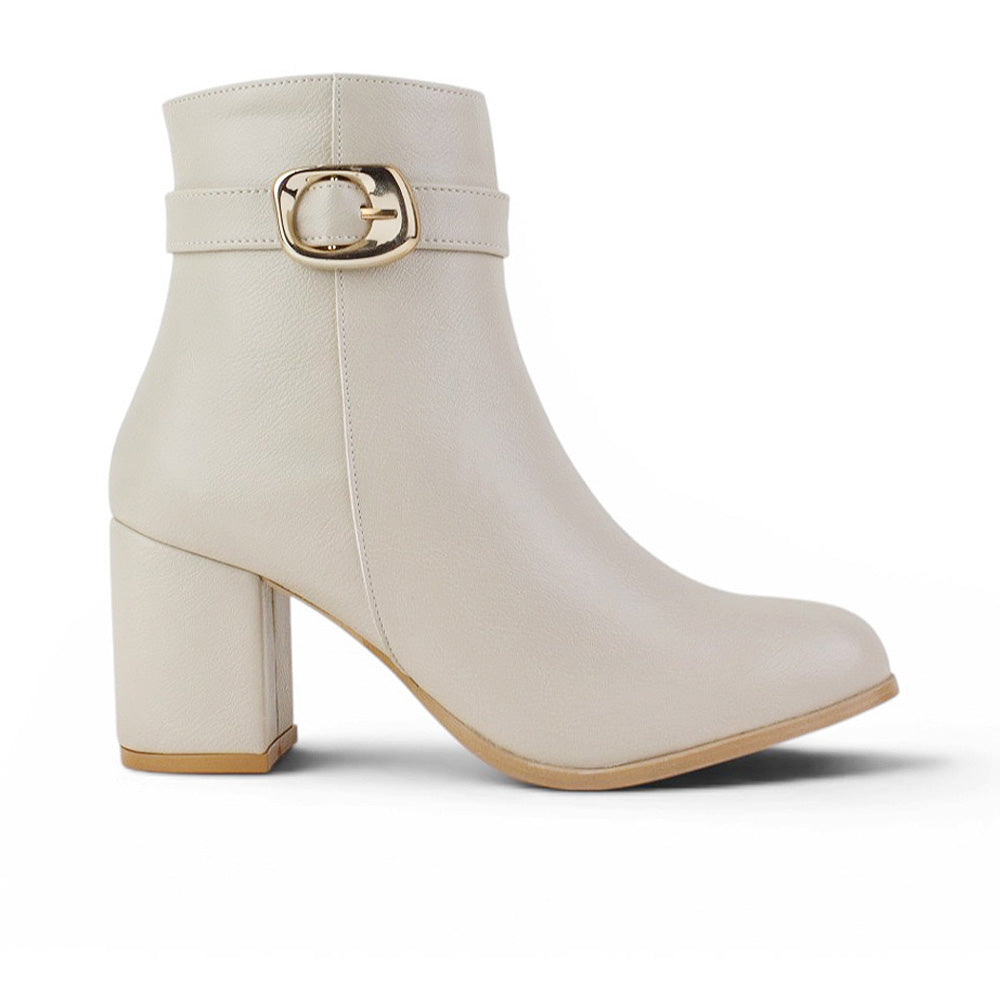 vista lateral de botas beige casuales para dama con tacón medio 7cm 