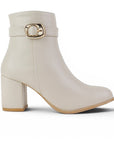 vista lateral de botas beige casuales para dama con tacón medio 7cm 