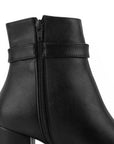 vista del detalle en cremallera de las botas negras para dama con tacón 7cm