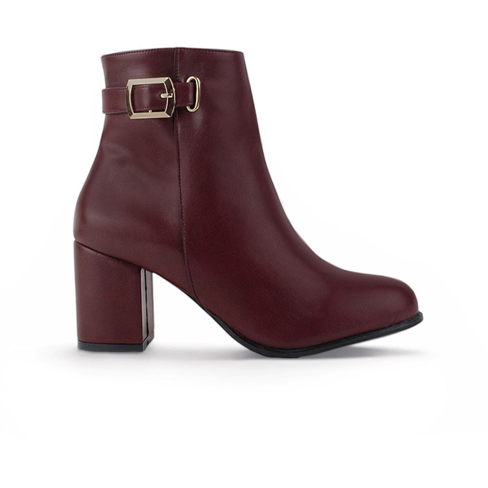 vista lateral en botas vino puntales de dama con tacón medio de 7cm 