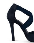 Vista trasera de zapatilla azul marino para mujer con tacon delgado medio