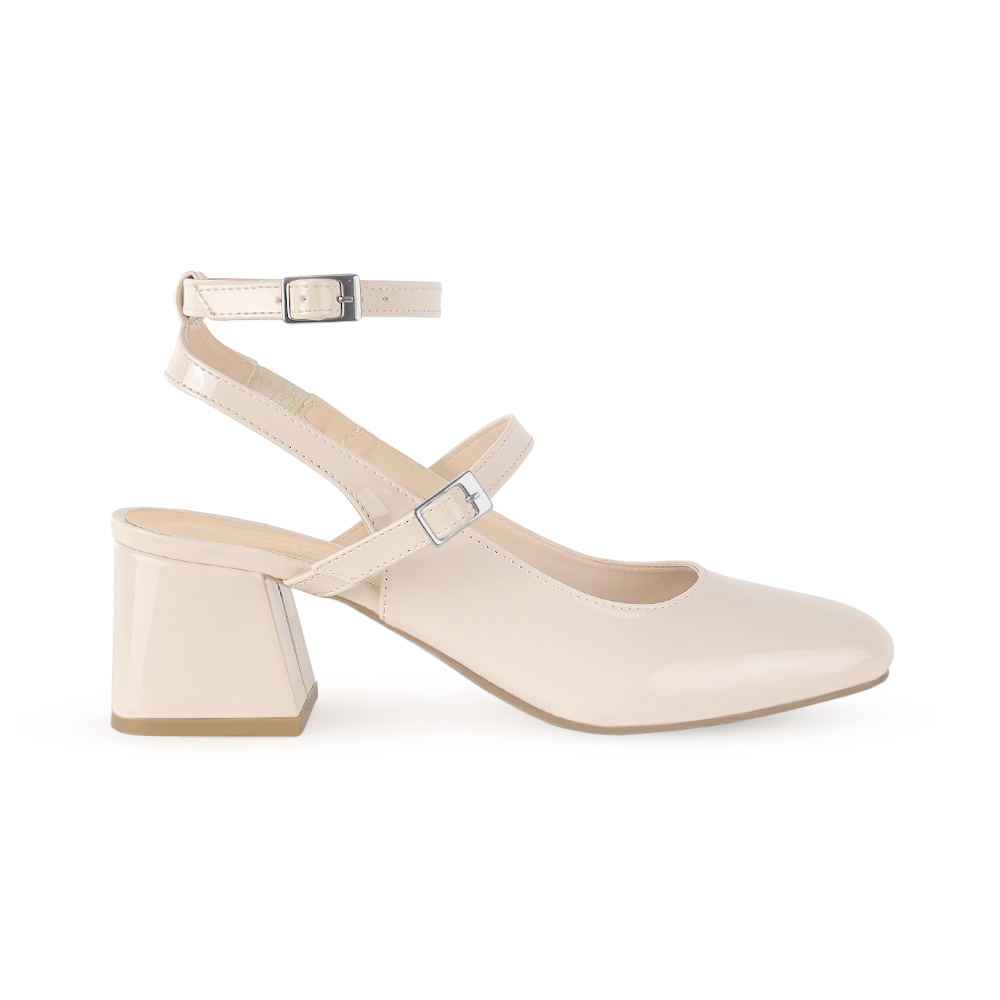 Vista lateral de zapatilla beige para mujer con doble hebilla y tacón de 5cm