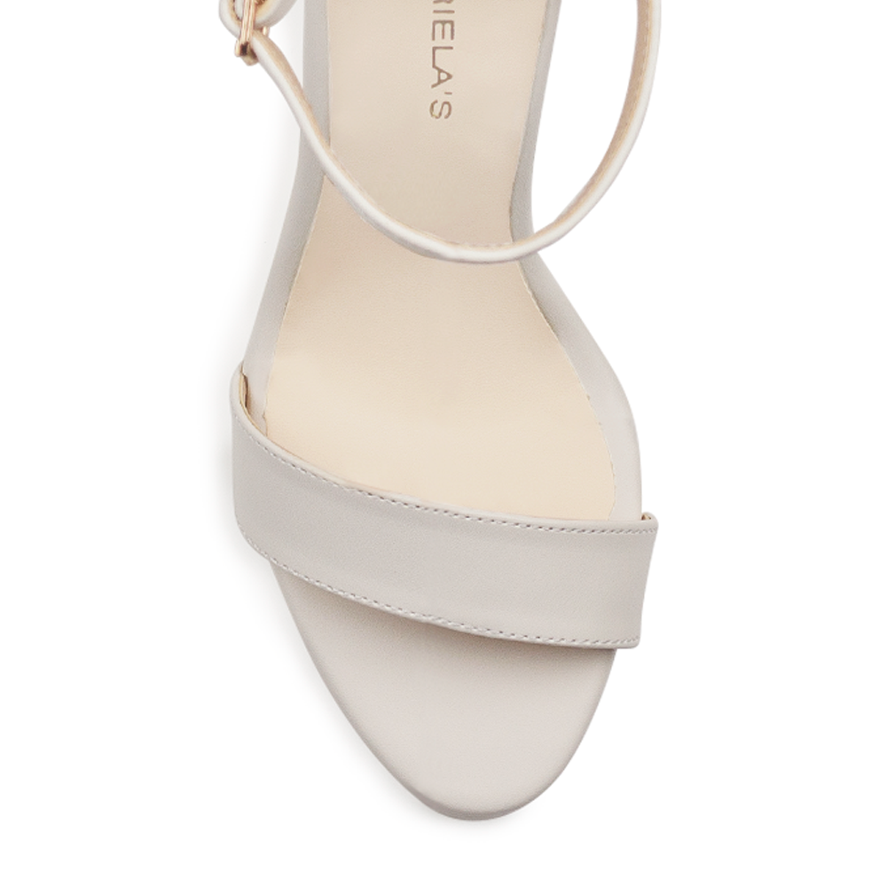 Vista del material cabra sintético de zapatilla beige para mujer
