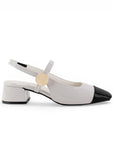 vista lateral de zapatillas beige con negro para mujer y tacón cuadrado