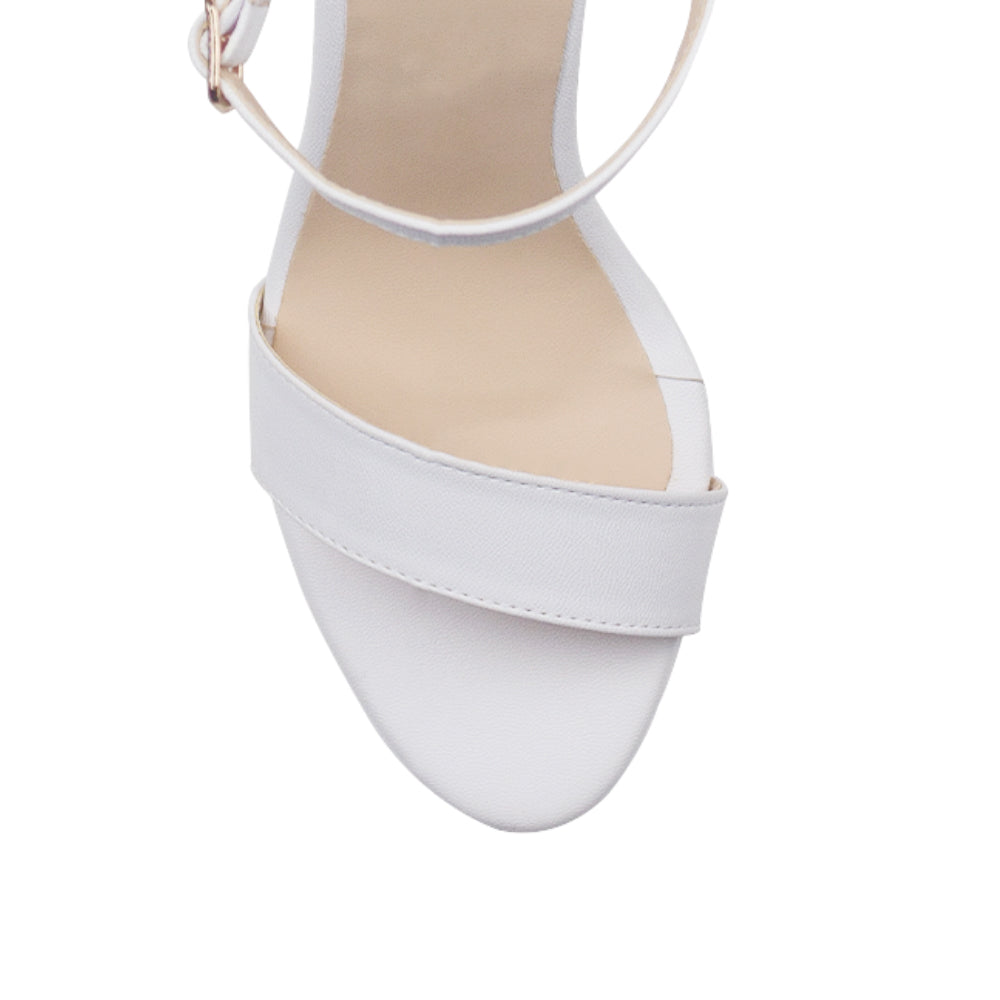 Vista del material cabra sintético de zapatilla blanca para mujer