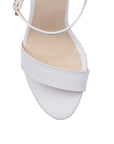 Vista del material cabra sintético de zapatilla blanca para mujer