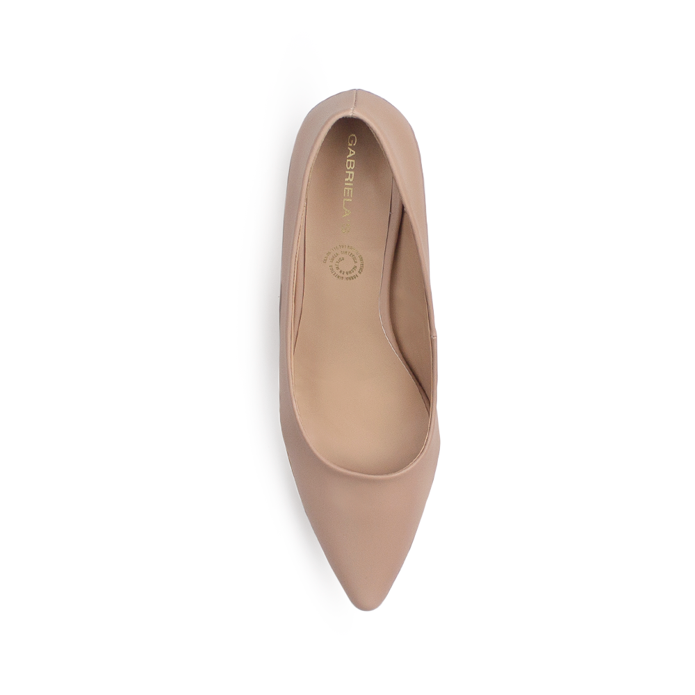 Vista superior de zapatilla tipo stiletto para mujer en color maquillaje