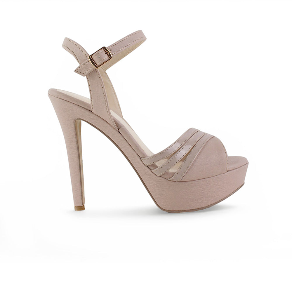 vista lateral de zapatillas maquillaje de dama con plataforma y tacón alto