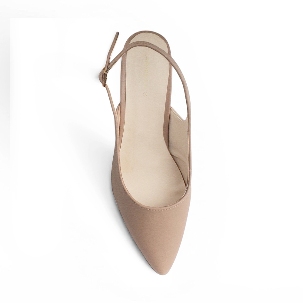 vista superior de zapatillas stiletto color maquillaje para dama con talón descubierto 