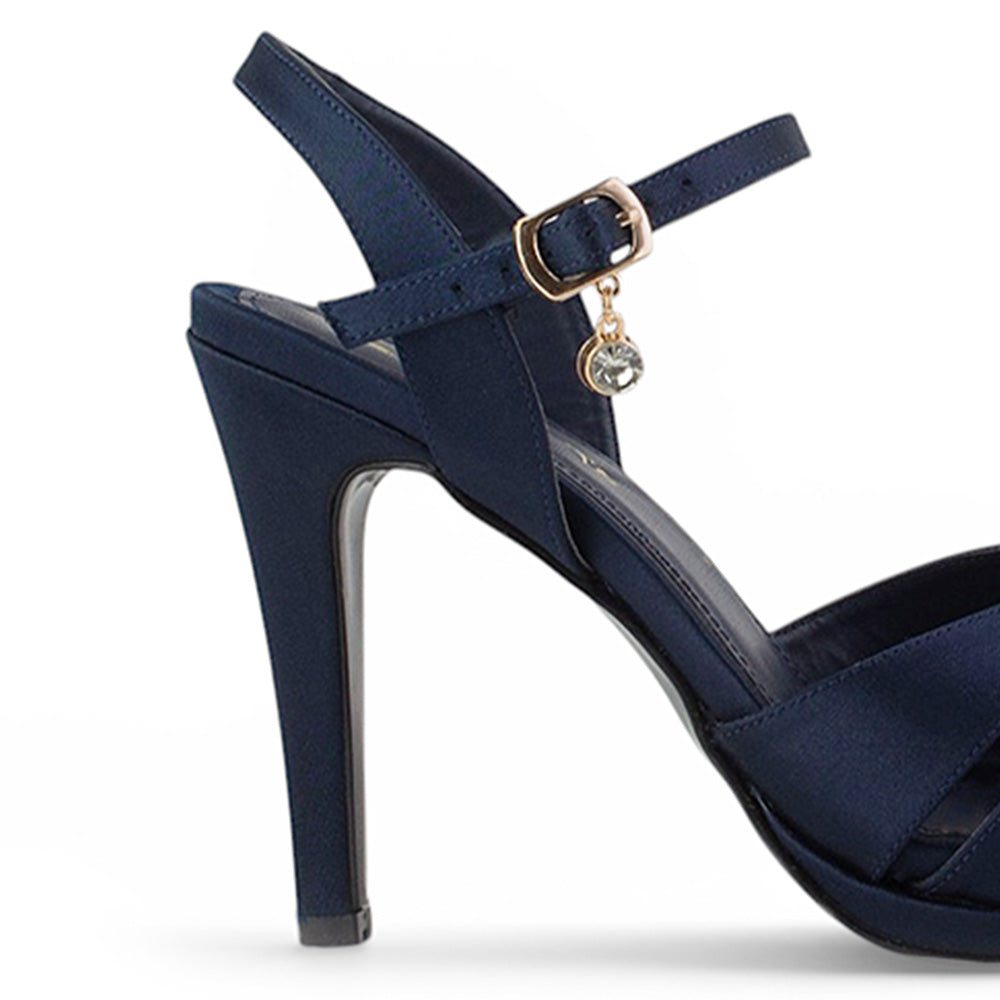 Vista trasera de zapatillas marino para mujer con tacón medio y tiras