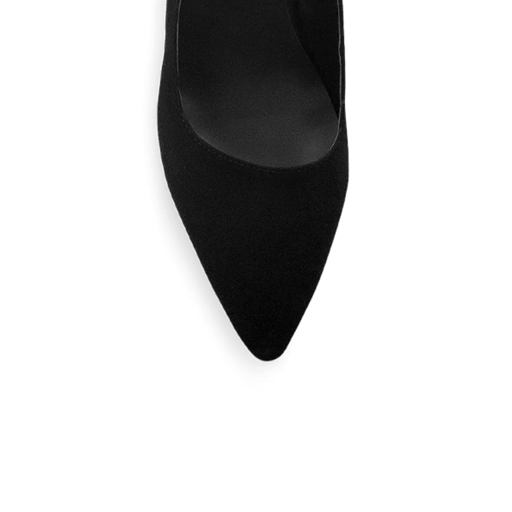 Vista de material buck sintético de zapatilla negra destalonada con tacón ancho de 6cm 