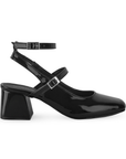 Vista lateral de zapatilla negra para mujer con doble hebilla y tacón de 5cm
