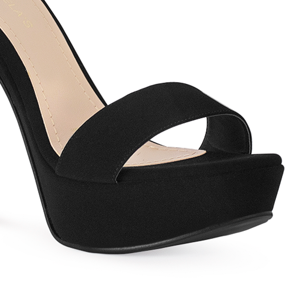 Vista de material buck de zapatilla color negro para mujer