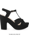 Vista lateral de zapatilla para mujer color negro con pulsera