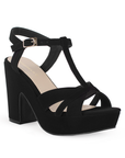 Vista diagonal de zapatilla con tacon ancho y pulsera color negro para mujer