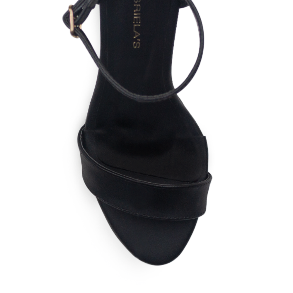 Vista del material buck de zapatilla negra para mujer