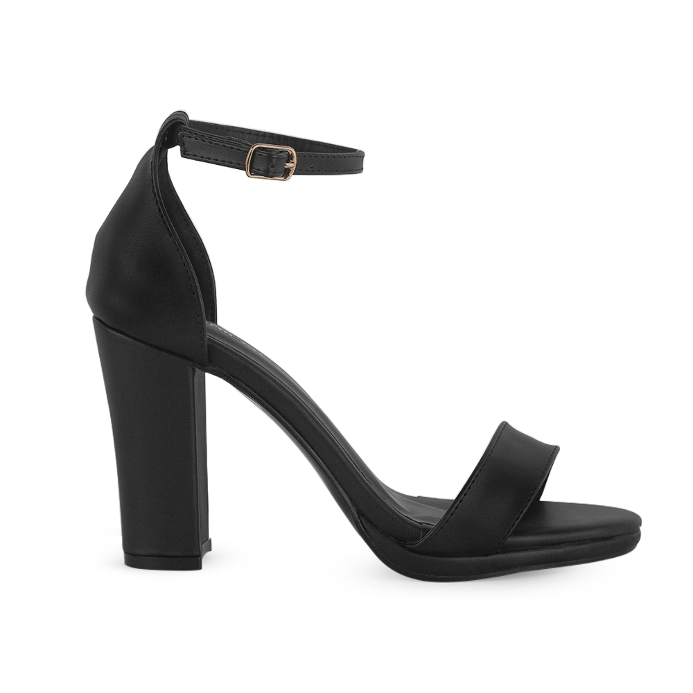 Vista lateral de zapatilla negra en acabado cabra sintético con pulsera y tacón medio de 10cm para mujer