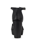 Vista trasera de tacón ancho de 10cm en zapatilla para mujer color negro cabra sintético 
