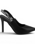 Vista lateral de zapatillas negras destalonadas para mujer  