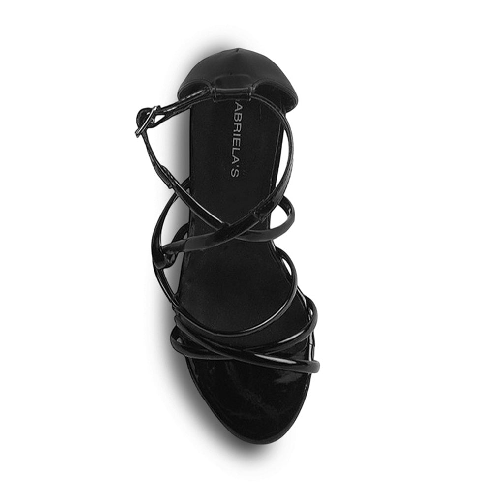 vista superior de las zapatillas negras para dama con detalle en tiras cruzadas 