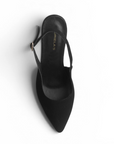 vista superior de zapatillas stiletto negras para dama con talón descubierto 
