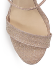Vista del material sintético de zapatilla oro para mujer