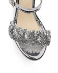 Vista de material sintético en zapatilla para mujer con pulsera y tacón 10cm de color plata 