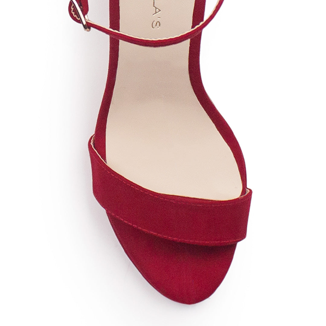 Vista del material durazno de zapatilla roja para mujer