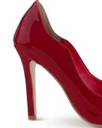 Vista trasera de tacón delgado 10cm en zapatilla puntal tipo stiletto de color rojo