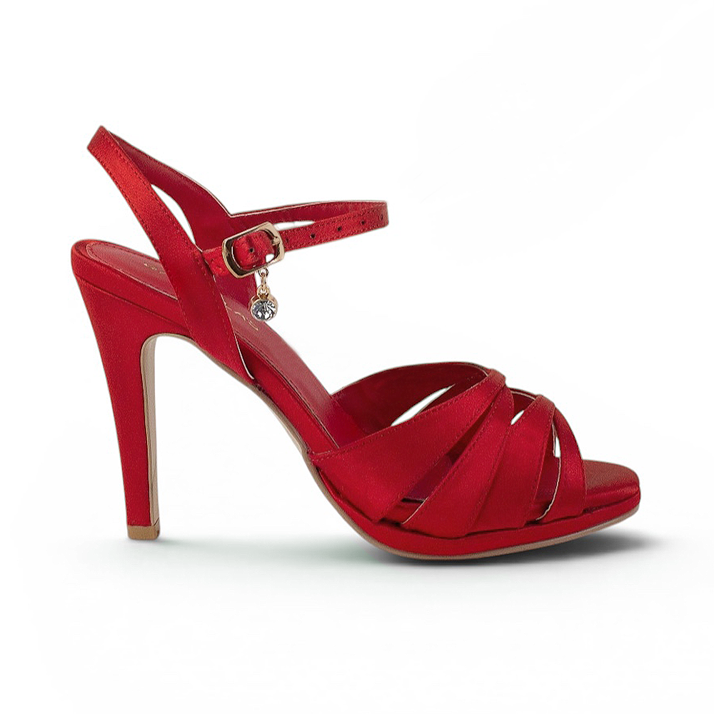 Vista lateral de zapatilla roja con tacón para mujer y tiras cruzadas