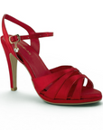 Vista diagonal de zapatilla roja para mujer con tiras cruzadas y tacón 