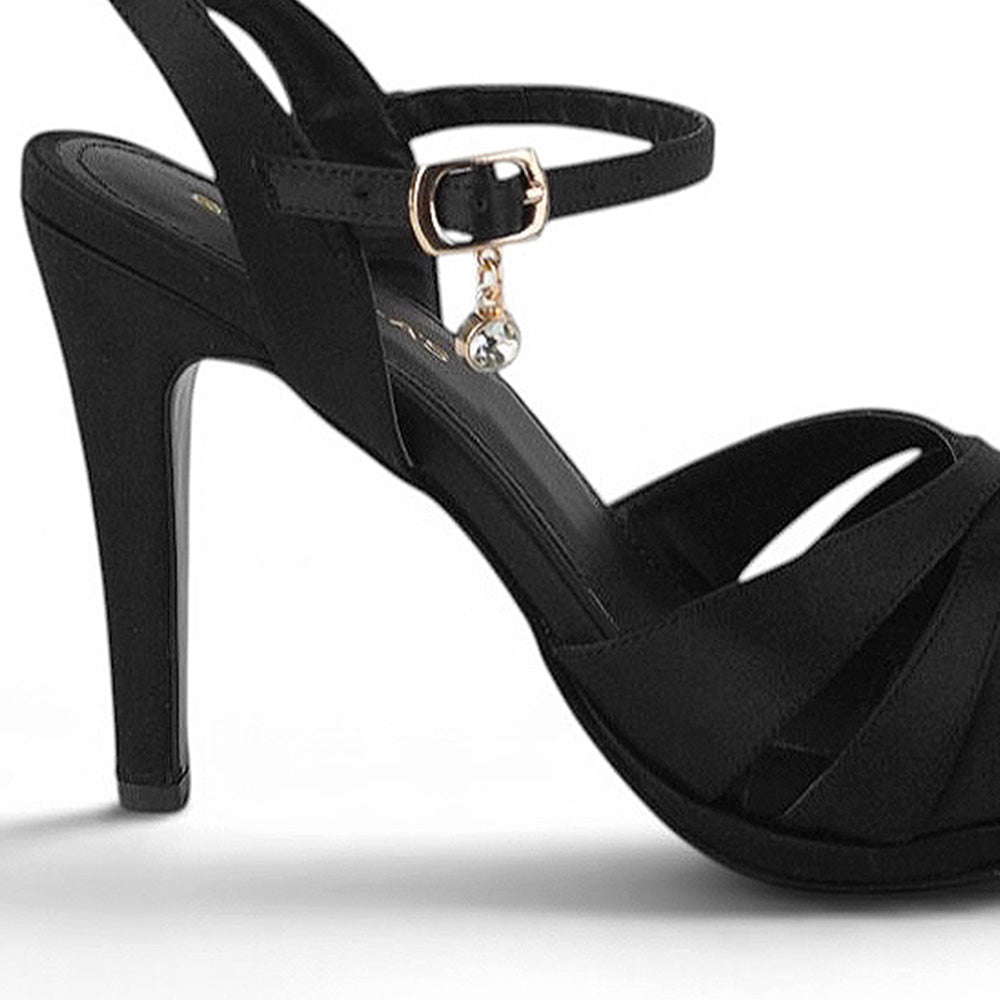 Vista trasera de zapatillas negras para mujer con tacón medio y tiras