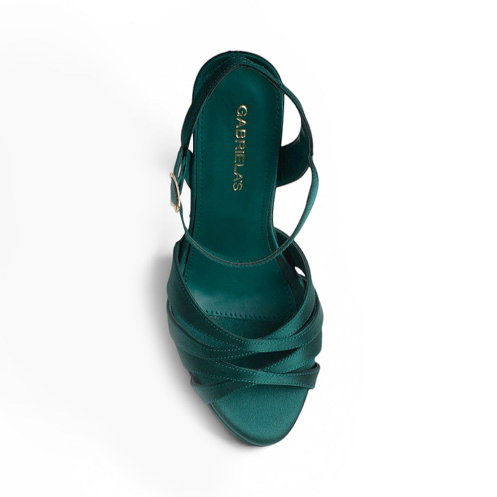 Vista superios de zapatilla verde con tacon medio y tiras para mujer